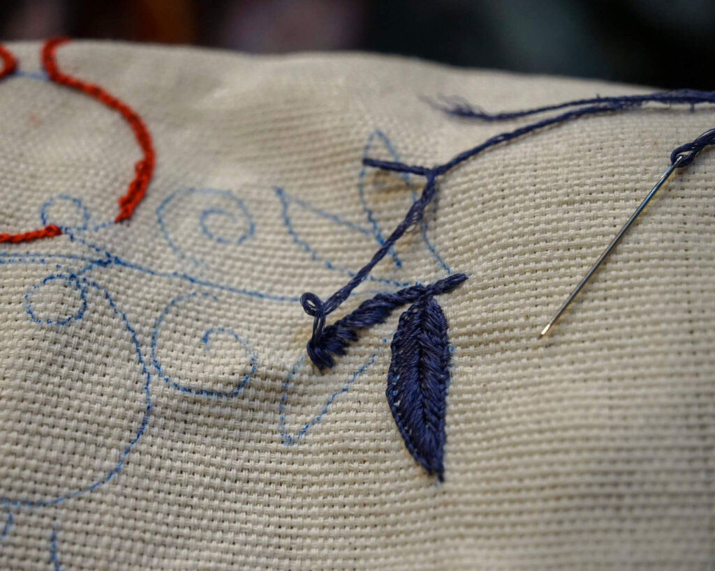 The long chain stitch style of filling space on a suzani