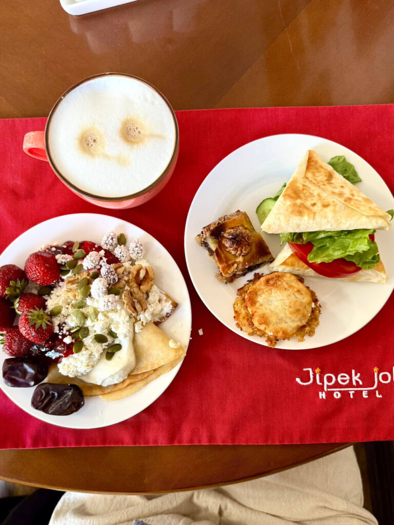 A breakfast spread at the Jipek Joli breakfast buffet: crepes, samsas, cheese, cappuccino