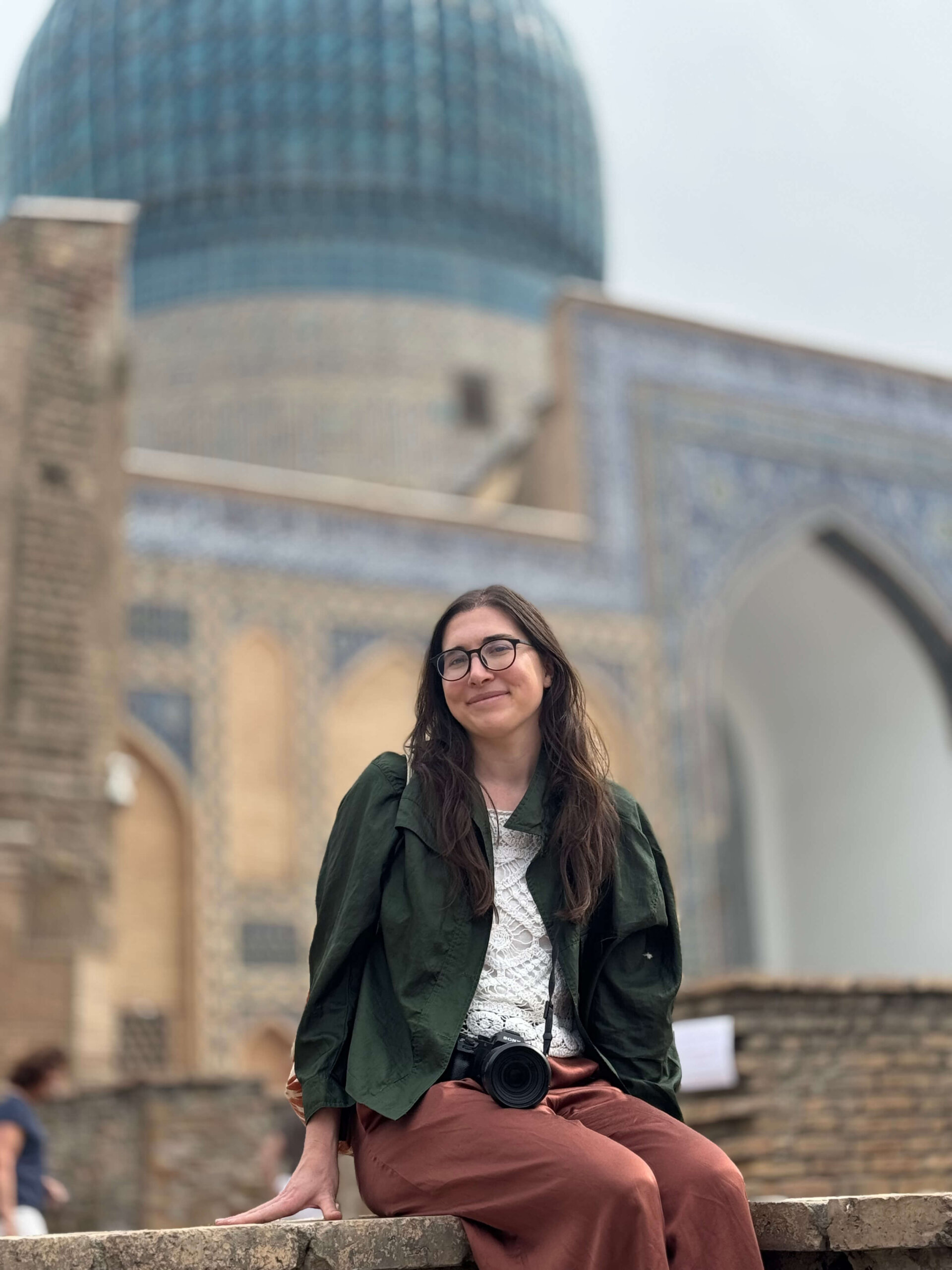 Allison wearing conservative clothing at an important burial site in Samarkand 
