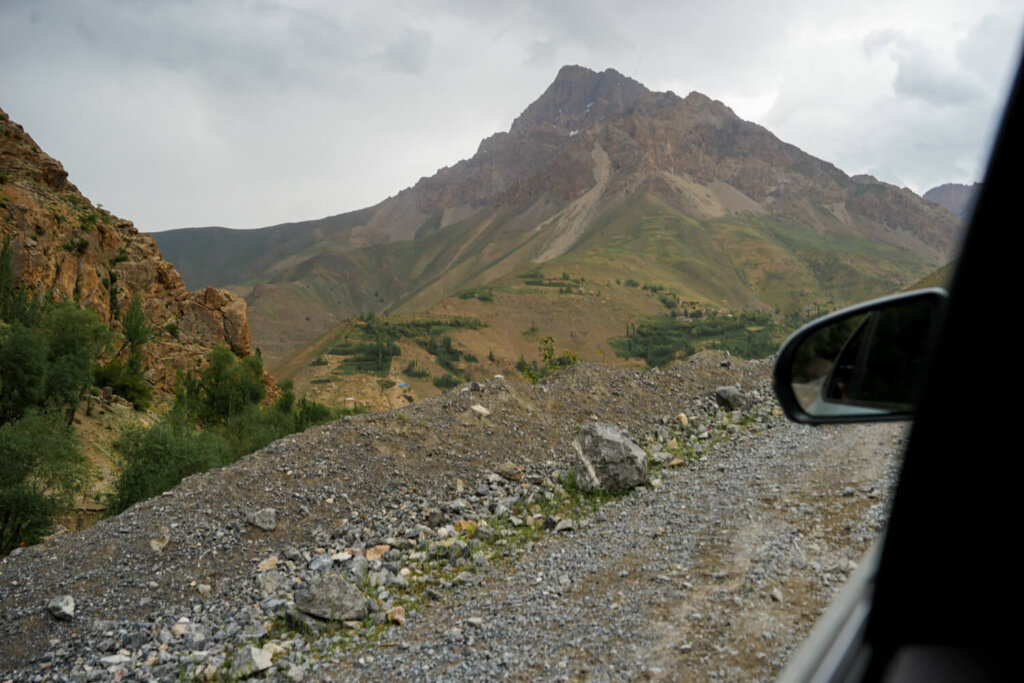 Views on the road with the car mirror visible