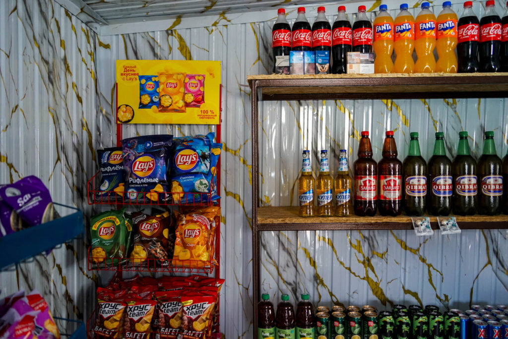 Mini market selling beer, chips, energy drinks... and no water