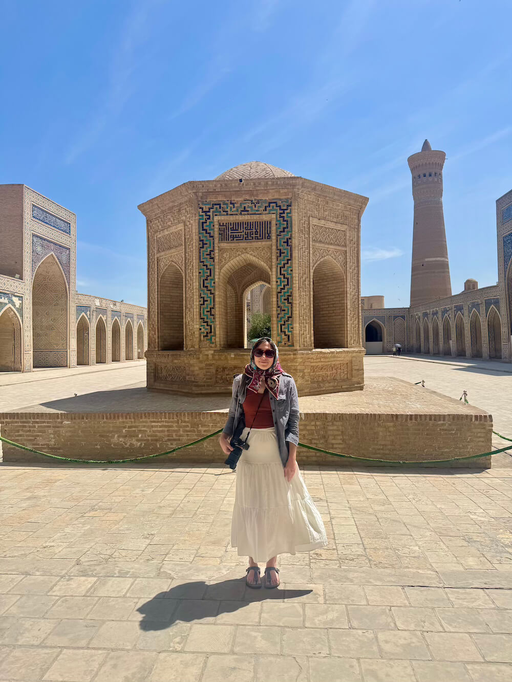 Allison wearing a full modesty outfit in Uzbekistan in Khiva with a headscarf and skirt